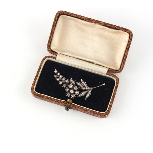 164 - A late Victorian diamond set floral spray brooch, the old cut diamonds weighing a total of approxima... 