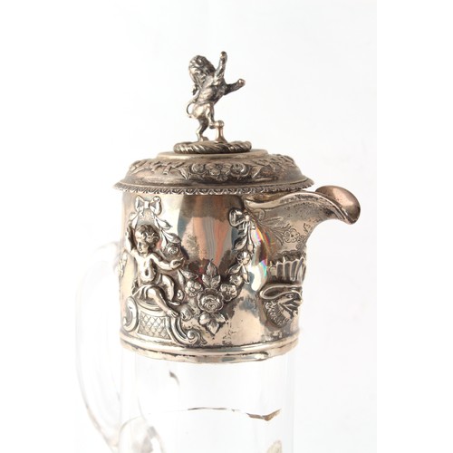 209 - Property of a lady - a Victorian silver mounted claret jug, with rampant lion finial & mask spout, w... 