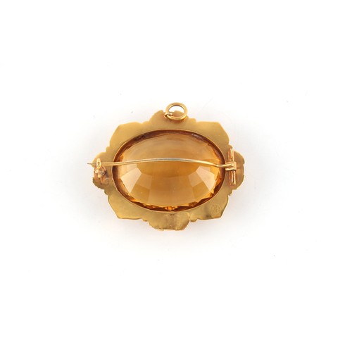 104 - Property of a lady - a Victorian unmarked gold (tests 15ct) oval cut citrine brooch, the large oval ... 