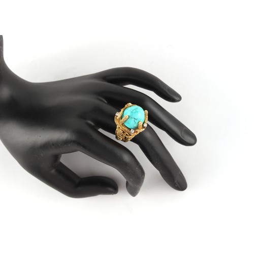 114 - Property of a gentleman - a modern unmarked yellow gold (tests 18ct) turquoise & diamond ring, the t... 