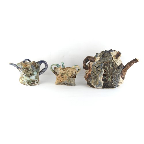 316 - Property of a deceased estate - three unusual studio pottery porcelain model teapots in the form of ... 