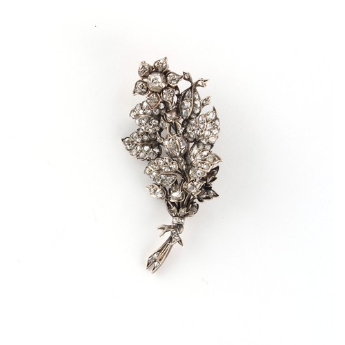 152 - A 19th century rose cut diamond floral spray brooch, the flowerhead mounted en tremblant, 60mm long.