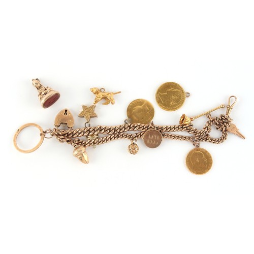 52 - Property of a lady - a 9ct gold charm bracelet, with heart shaped clasp, the charms including gold c... 