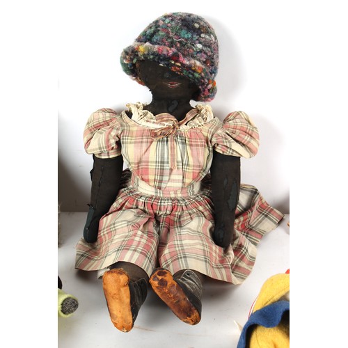 273 - Property of a lady - a late 19th / early 20th century American black rag doll, approximately 25.5ins... 