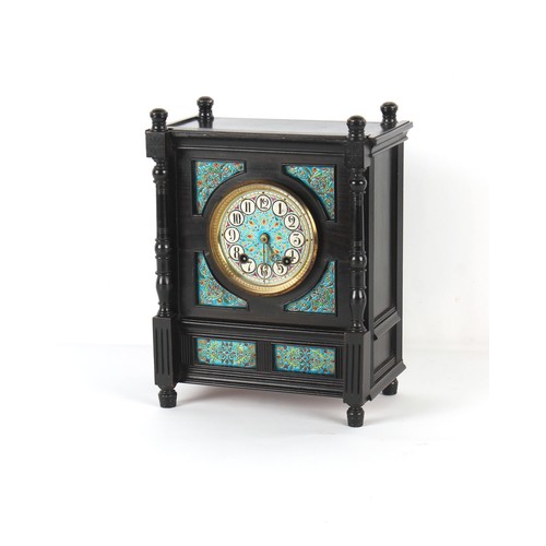 300 - Property of a lady - an Aesthetic Movement ebonised cased mantel clock with French Emaux De Longwy f... 