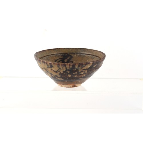 270 - Property of a lady - a Chinese Jizhou paper-cut bowl, Song Dynasty or later, 4.7ins. (12cms.) diamet... 