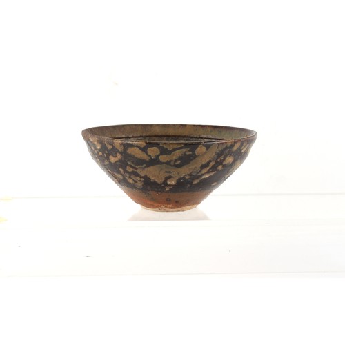 270 - Property of a lady - a Chinese Jizhou paper-cut bowl, Song Dynasty or later, 4.7ins. (12cms.) diamet... 