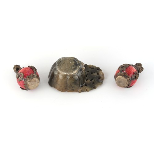 266 - Property of a gentleman - a pair of Chinese silver mounted red stone balls, possibly scroll weights,... 