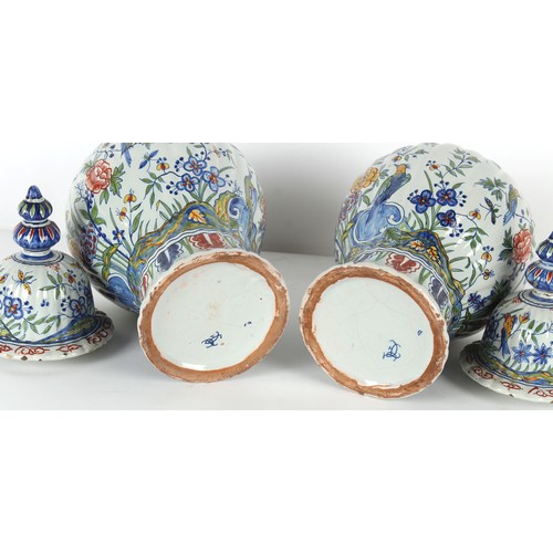 254 - Property of a lady - a pair of Dutch polychrome Delft vases & covers, 19th century, of fluted balust... 