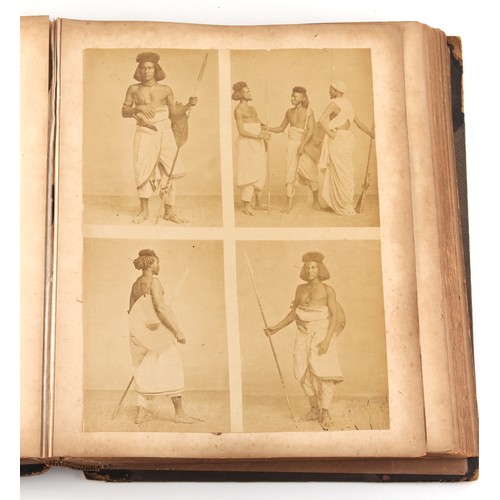 204 - Property of a lady - a Victorian photograph album containing albumen prints, including one of a rock... 