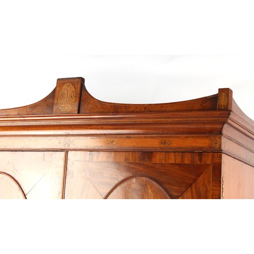 326 - Property of a gentleman - a good quality George III mahogany linen press, with inlaid plume of feath... 