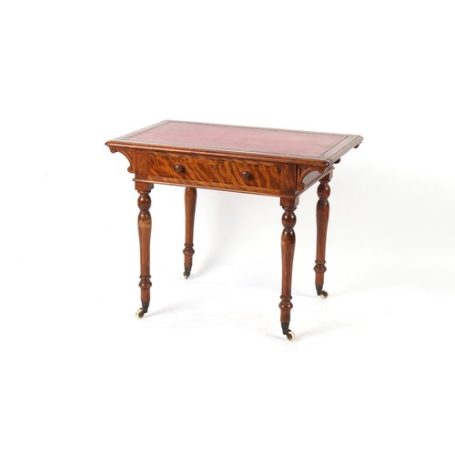 339 - Property of a lady - a Victorian mahogany writing table with red leather inset top, the frieze drawe... 