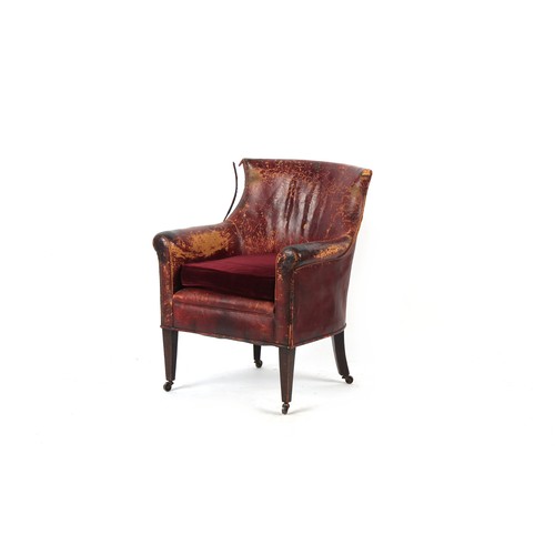 341 - Property of a lady - an early 20th century dark red leather upholstered library armchair or tub chai... 