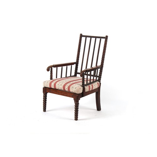 358 - Property of a lady - an early 19th century Regency period bobbin armchair, with cane panelled seat &... 