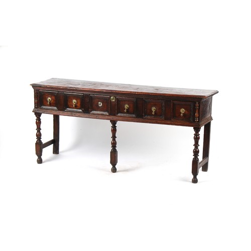 412 - Property of a deceased estate - a late 17th / early 18th century oak dresser with three moulded draw... 