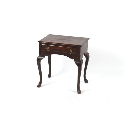 364 - Property of a deceased estate - an oak lowboy with frieze drawer, on cabriole legs, 25ins. (63.5cms.... 