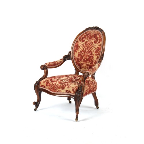 381 - Property of a deceased estate - a Victorian carved walnut & upholstered armchair, with cabriole fron... 