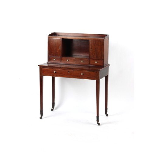 382 - Property of a deceased estate - a George III mahogany bonheur du jour, with turned ivory knobs, on s... 