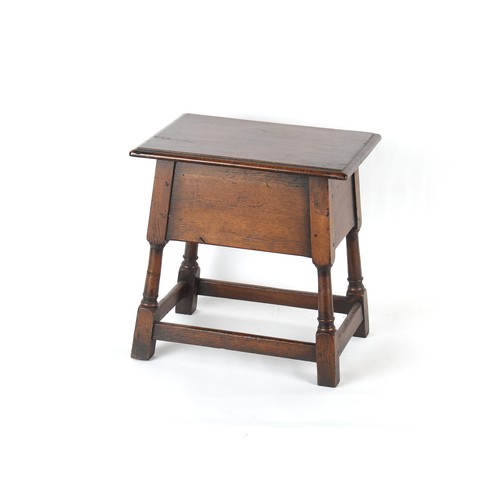 396 - Property of a deceased estate - a reproduction oak box stool, 20.85ins. (53cms.) long.