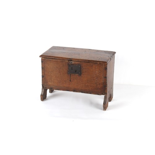 407 - Property of a deceased estate - a small 17th century oak six plank coffer, one hinge broken, the oth... 