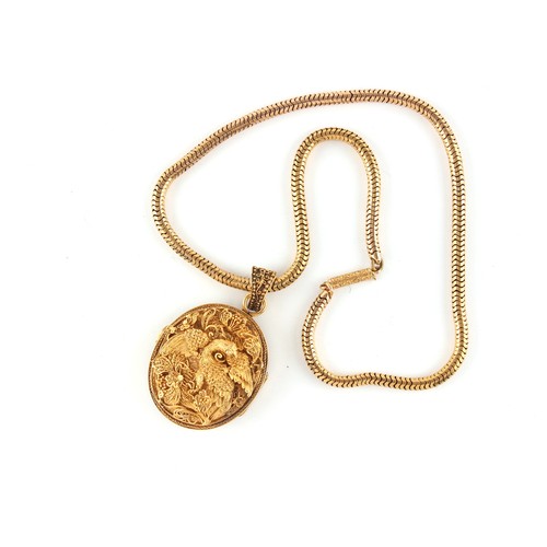 61 - Property of a gentleman - a Chinese 18ct yellow gold oval locket pendant with filigree Phoenix decor... 