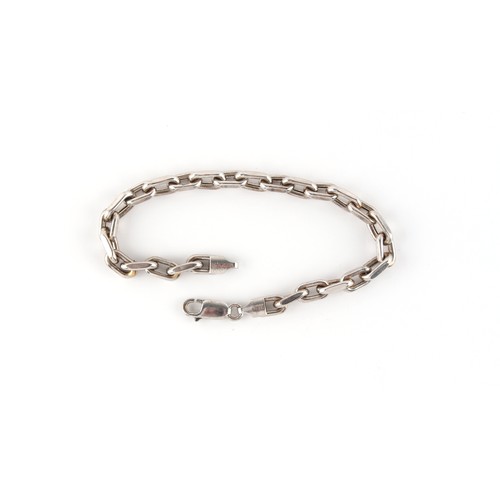 54 - An 18ct white gold chain bracelet, approximately 11.2 grams, 7.75ins. (19.7cms.) long.