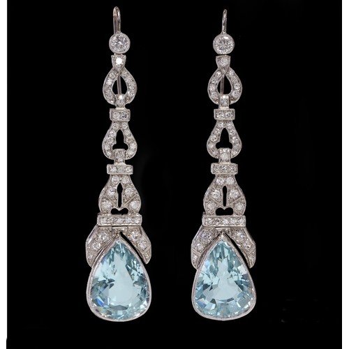 39 - A pair of white gold aquamarine & diamond long pendant earrings, the large pear shaped aquamarines w... 