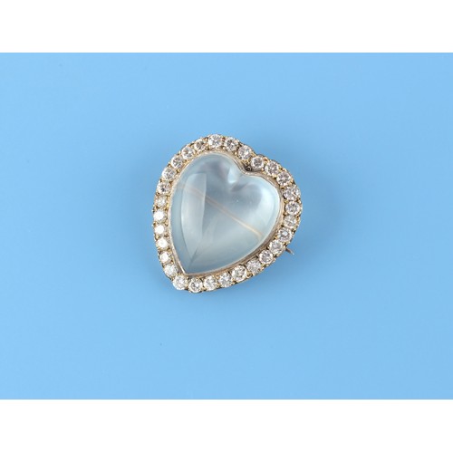 74 - A moonstone & diamond heart shaped brooch, the heart shaped moonstone measuring approximately 22 by ... 