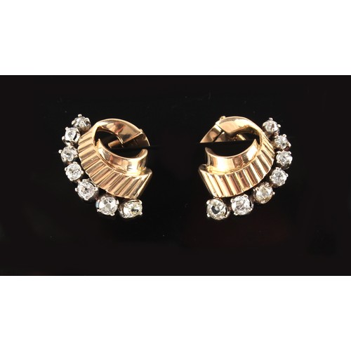 37 - A pair of modern unmarked yellow gold diamond earrings, with clip fastenings, the estimated total di... 