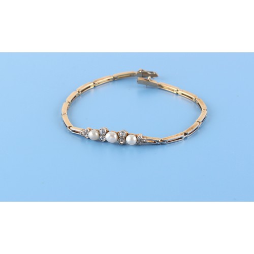 94 - An early 20th century diamond & pearl bracelet, set with three pearls & ten rose cut diamonds, 6.5in... 