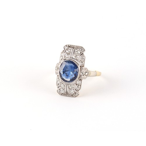 105 - An early 20th century Art Deco period sapphire & diamond ring, the oval cut sapphire weighing approx... 