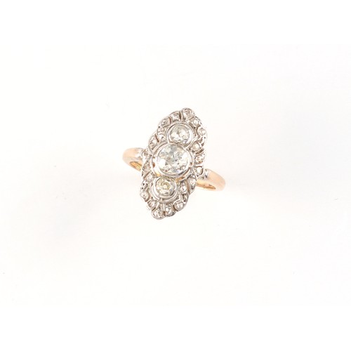 100 - An early 20th century Belle Epoque diamond pierced oval panel ring, the total diamond weight approxi... 