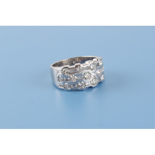 73 - A modern 18ct white gold diamond band ring set with three rows of alternating round brilliant cut & ... 