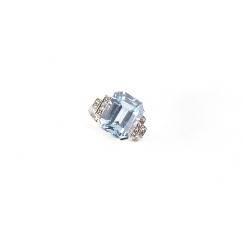 91A - Property of a lady - an Art Deco style unmarked white gold aquamarine & diamond ring, the octagonal ... 