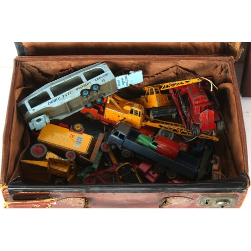 203 - Property of a deceased estate - a mixed lot including an attache case containing assorted Dinky Toys... 