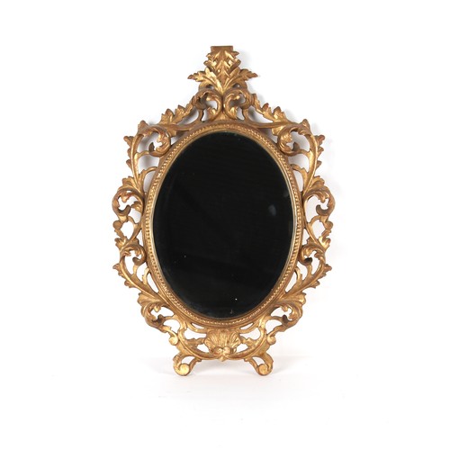 204 - Property of a lady - a late 19th / early 20th century Florentine carved giltwood framed wall mirror,... 