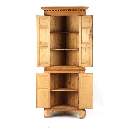 222 - Property of a lady - a George III pine two-part corner cabinet enclosing shaped shelves, 83ins. (211... 