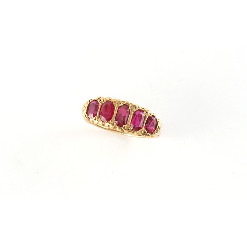 110 - A late Victorian unmarked 18ct yellow gold (tested) ruby five stone ring, the five graduated oval cu... 