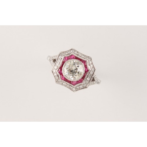 144 - Property of a deceased estate - an Art Deco style 18ct white gold diamond & ruby ring, the centre tr... 