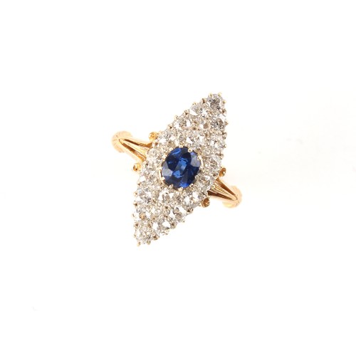 112 - An 18ct yellow gold sapphire & diamond navette shaped cluster ring, the oval cushion cut sapphire of... 