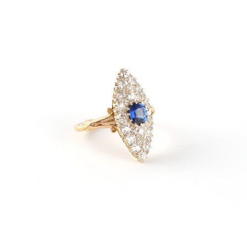 112 - An 18ct yellow gold sapphire & diamond navette shaped cluster ring, the oval cushion cut sapphire of... 
