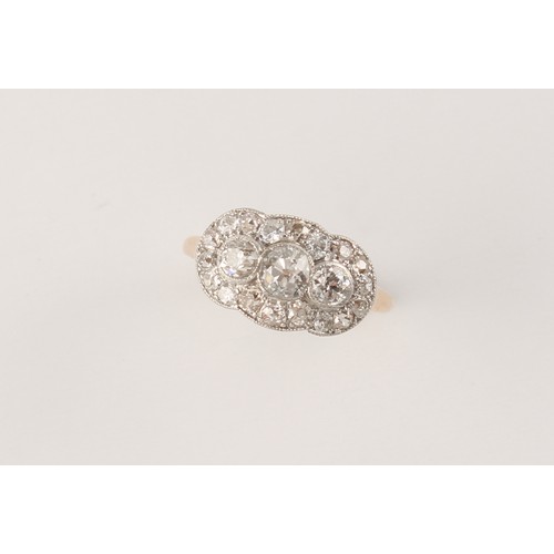 81 - An early 20th century unmarked yellow gold diamond ring set with three Old European cut diamonds wit... 