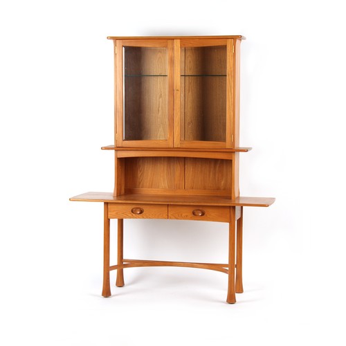 303 - Property of a lady - an Ercol Kelmscot limited edition elm & beechwood cabinet, number 121 of 125, w... 