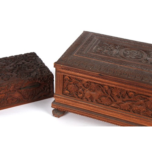 57 - Property of a lady - a mid 19th century Indian carved sandalwood box with interior tray with lidded ... 