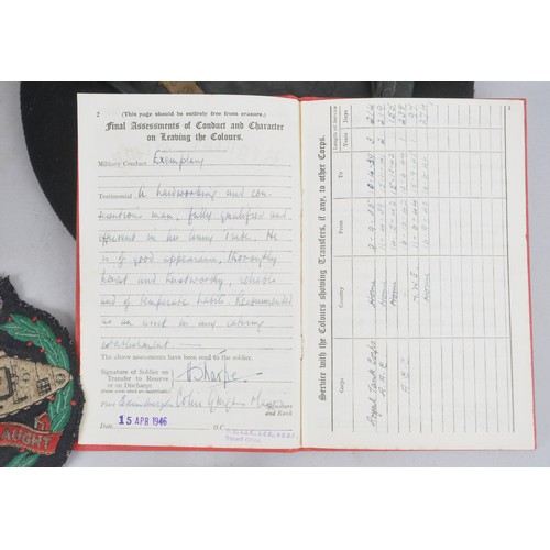 56 - An Armoured crew lot to 7886045 Harold Sharpe consisting of black tankers beret with correlating ser... 