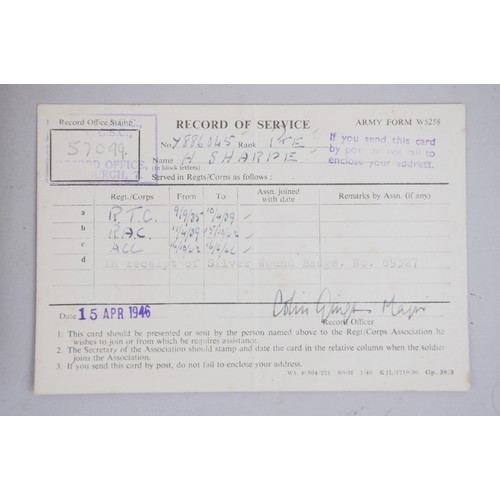 56 - An Armoured crew lot to 7886045 Harold Sharpe consisting of black tankers beret with correlating ser... 