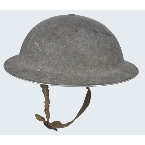 49 - WW2 British flashed helmet to the Duke of Cornwalls Light Infantry. MkII helmet issued in smooth kha... 