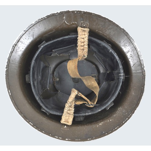 49 - WW2 British flashed helmet to the Duke of Cornwalls Light Infantry. MkII helmet issued in smooth kha... 