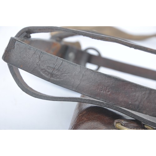 56 - WW1 British Assorted Sam Browne Equipment. Comprising cavalry canteen cradle dated 1918, pistol ammu... 