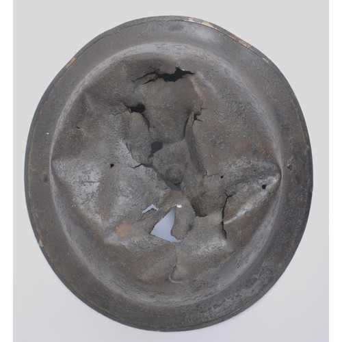 117 - Battle Damaged British MkII Helmet. Reputedly recovered in Holland , MkII combat shell with extensiv... 
